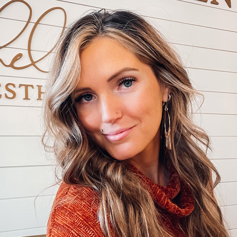 a woman smiling for the camera