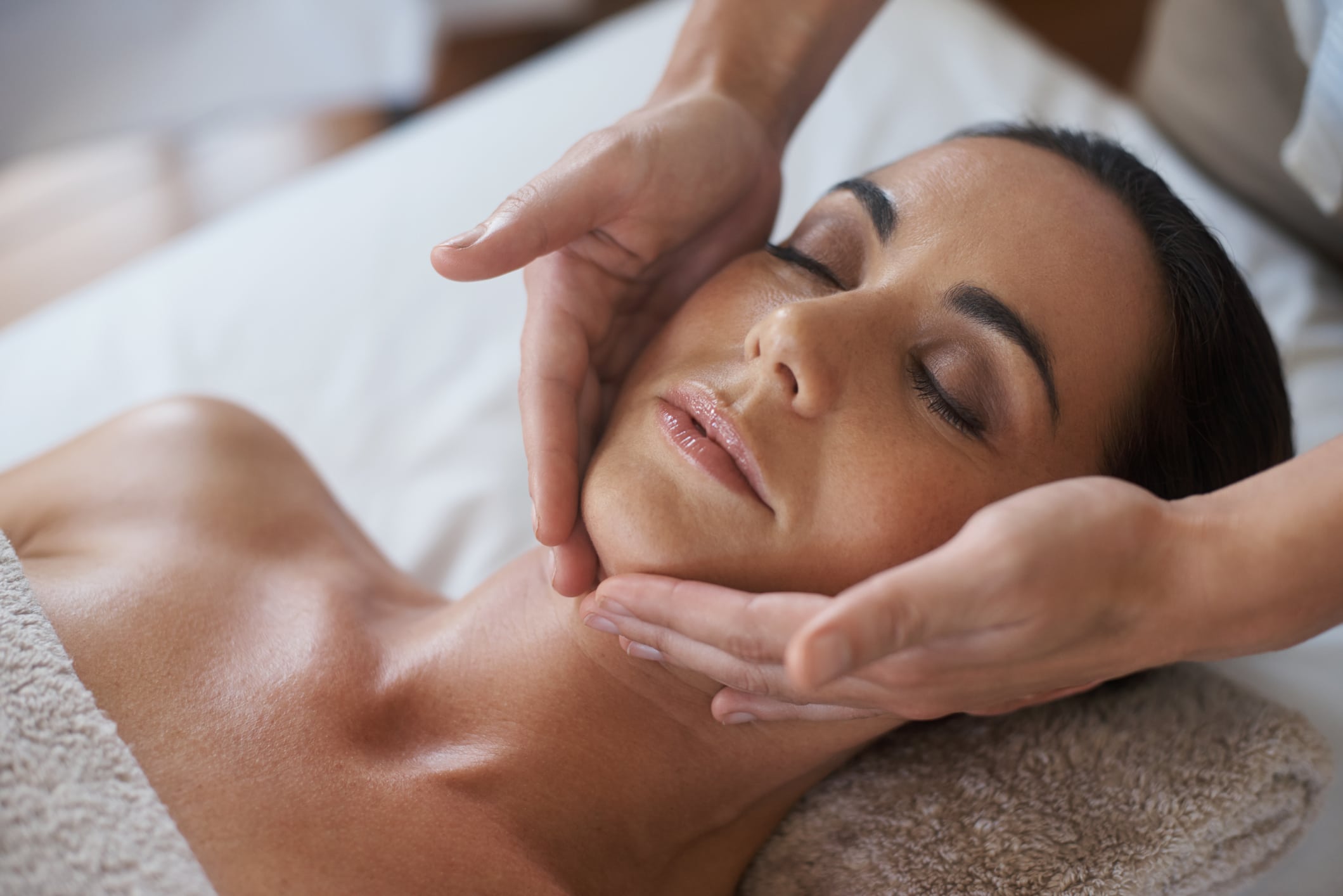 a person lying on a bed