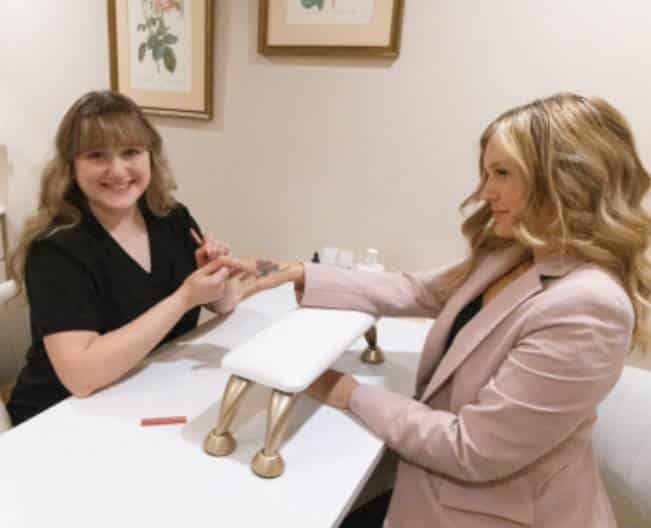 a group of people sitting at a table